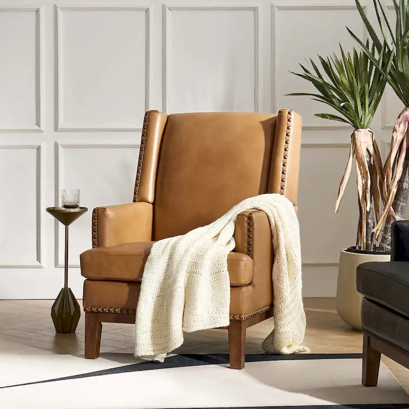 Fauteuil Lourdes en cuir véritable avec structure en bois massif et coussin d'assise amovible